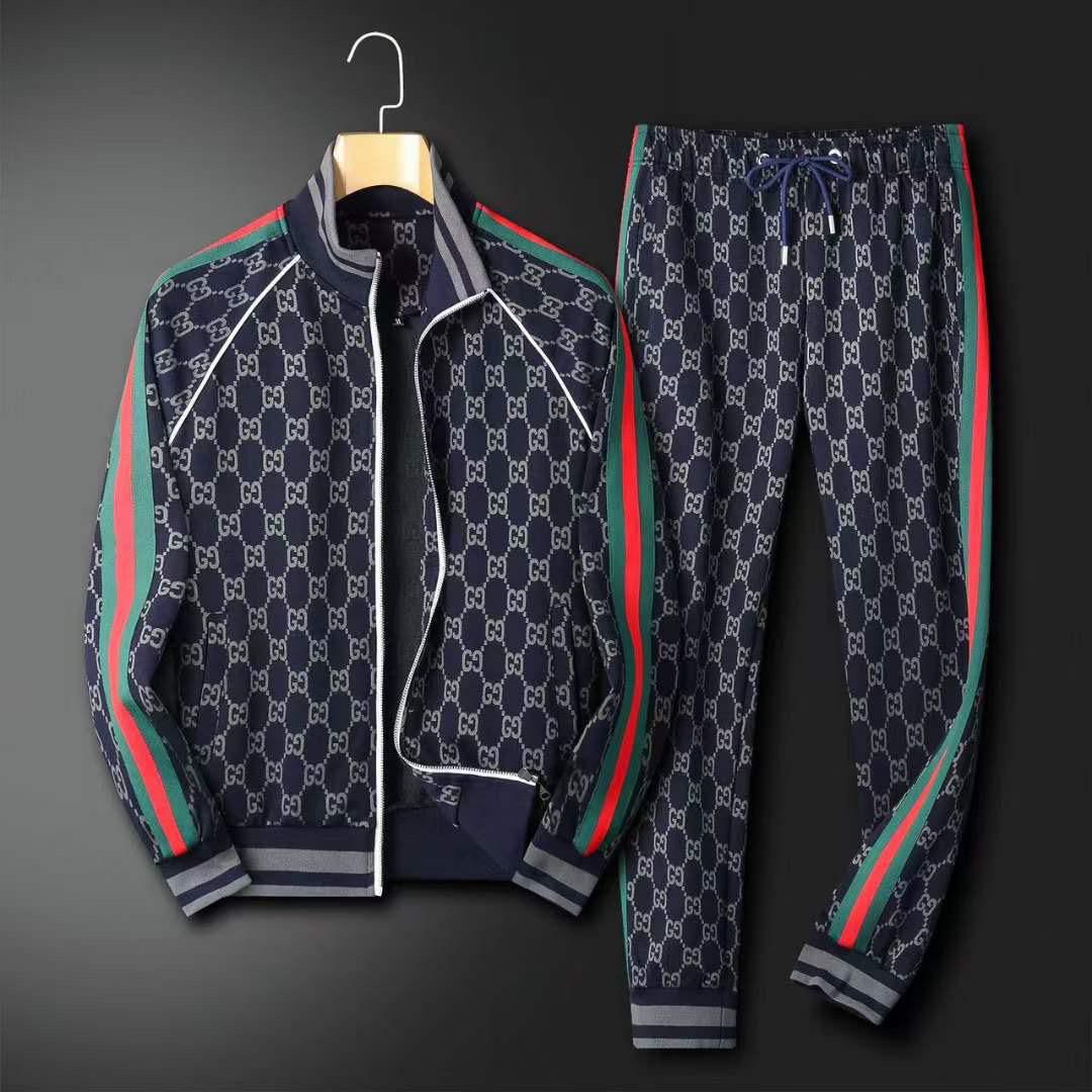 Gucci  Tuta  sportiva in jersey di cotone con monogramma e finiture in Web