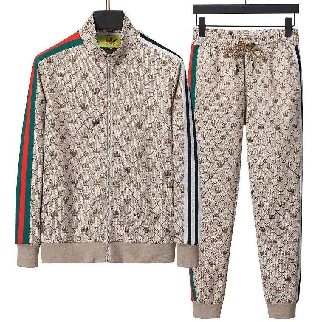 Gucci  Tuta  sportiva in jersey di cotone con monogramma e finiture in Web