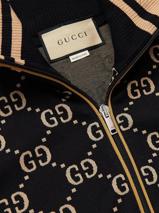 Gucci  Tuta  sportiva in jersey di cotone con monogramma e finiture in Web